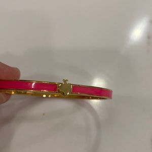 Kate Spade gold and pink enamel bracelet.